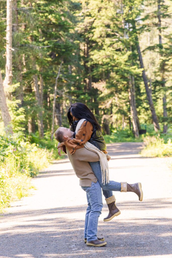 Man lifts fiancé into air shortly after getting engaged near Girdwood, Alaska.