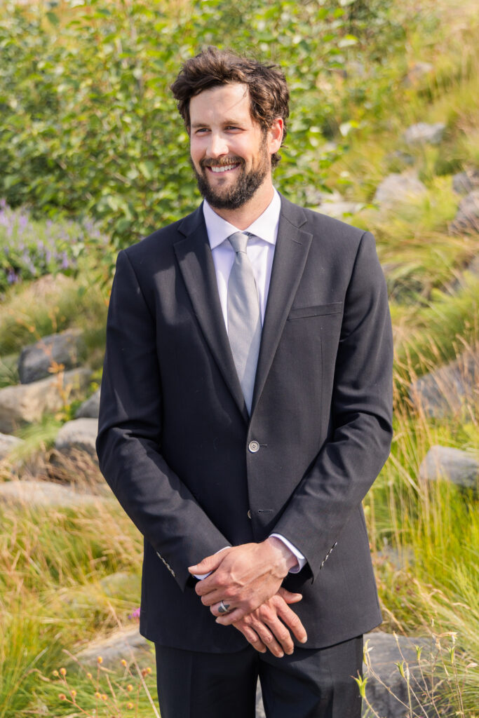 Groom portrait after Alaska elopement ceremony