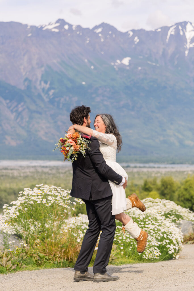 Bride and groom portraits after Alaska elopement ceremony in the mountains