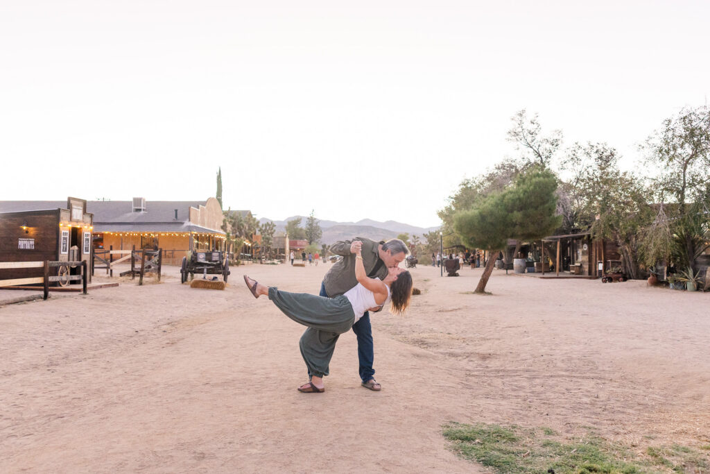 David dips Lisa for a kiss in the middle of Pioneertown's historic Mane Street.