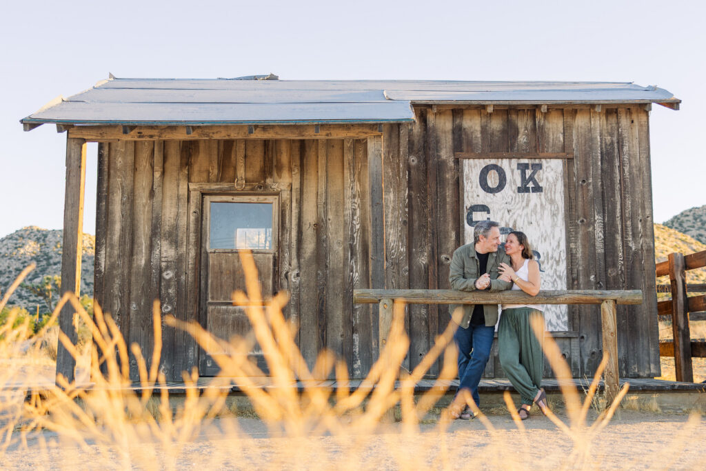 David and Lisa posing in front of the rustic O.K. Corral in Pioneertown, California.