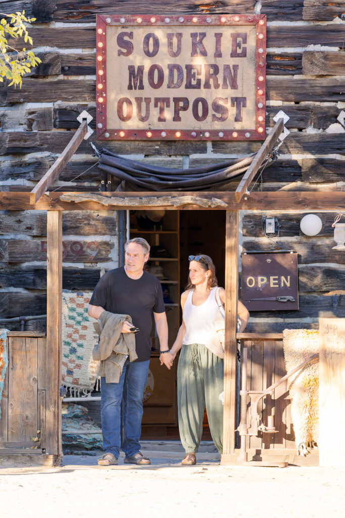 David and Lisa exploring the rustic Soukie Modern Outpost storefront.